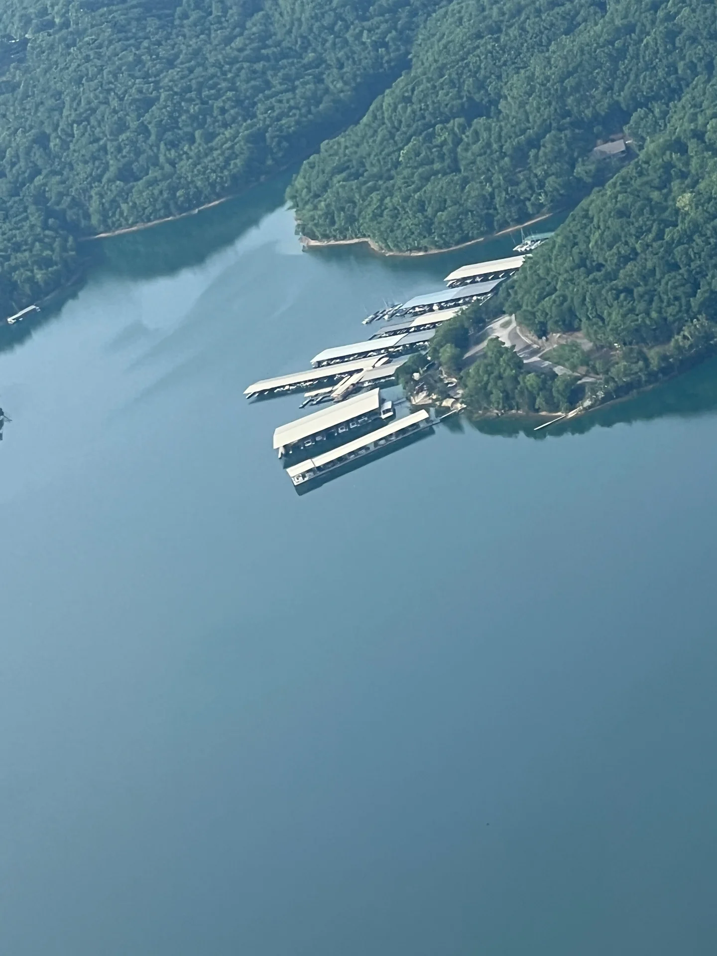 Aerial view of Starkey Marina's covered boat slips on Beaver Lake